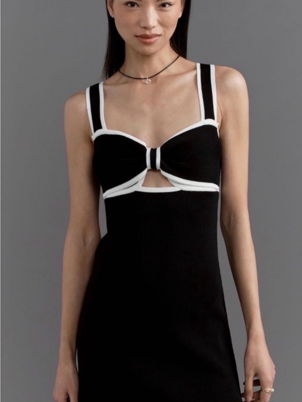 Anthropologie Black Dress with White Trim Bow Front